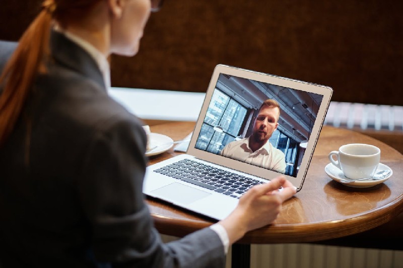 "Remote team participating in live online Spanish business language training"